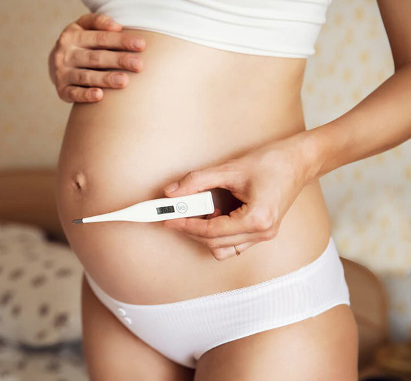 Перед родами поднялась температура у беременной женщины: что делать?