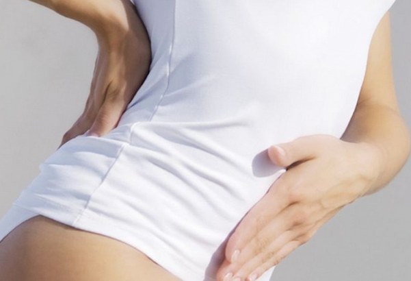 Почему возникают боли в спине при менструации