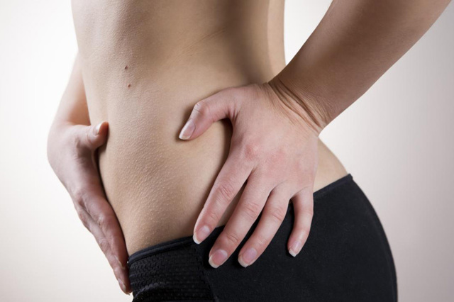 Причины болей в боку перед менструацией